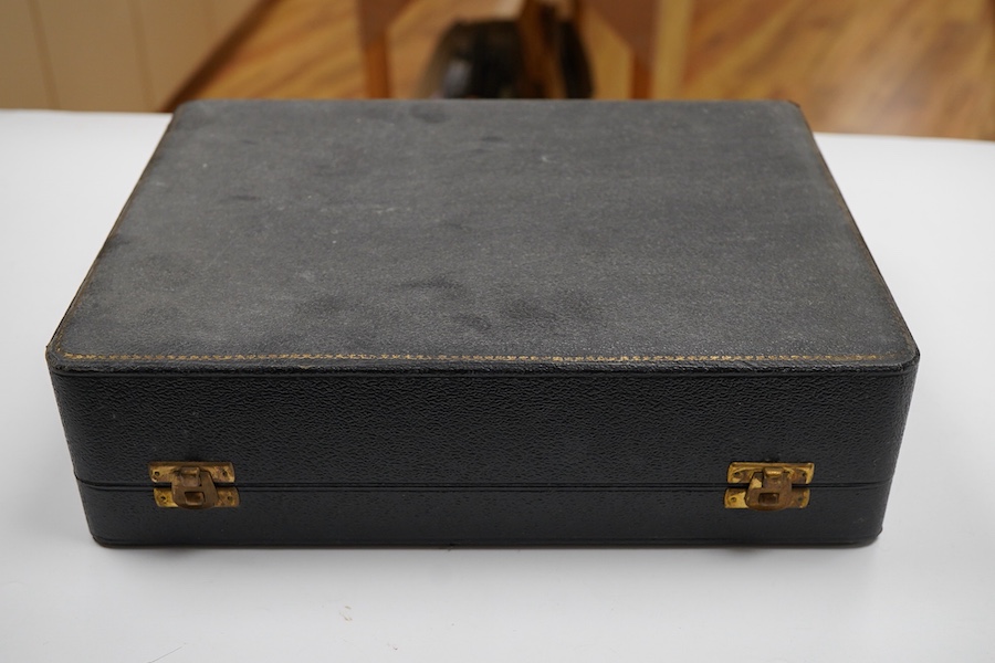 A cased six piece silver condiment set by Finnegans, Ltd, Birmingham, 1940, together with four earlier matched silver condiment spoons by Adie Brothers, 20oz.